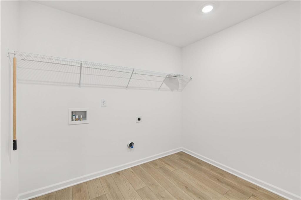 280 Silverleaf Trail Bethlehem, GA 30620 - Photo 32 of 40 a view of a room with racks on the wall