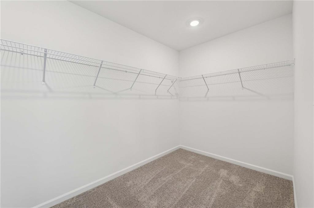 280 Silverleaf Trail Bethlehem, GA 30620 - Photo 37 of 40 a view of a room with racks on the wall