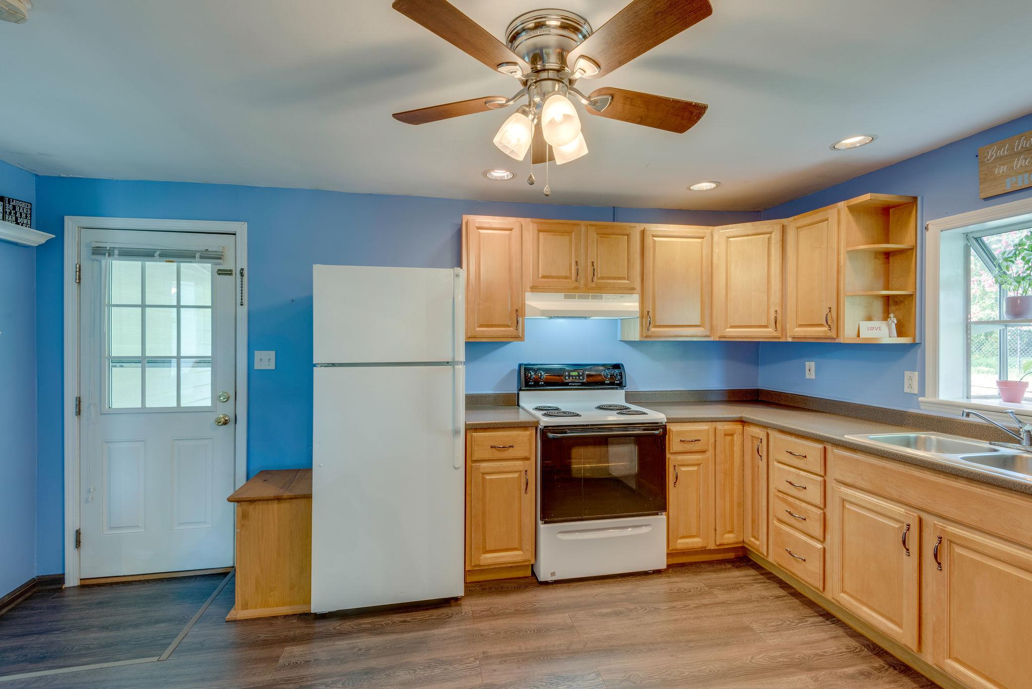 updated kitchen with lots of natural lighting