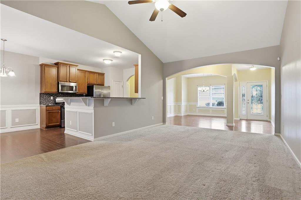 236 Manous Way Canton, GA 30115 - Photo 5 of 25 a large kitchen with cabinets and stainless steel appliances