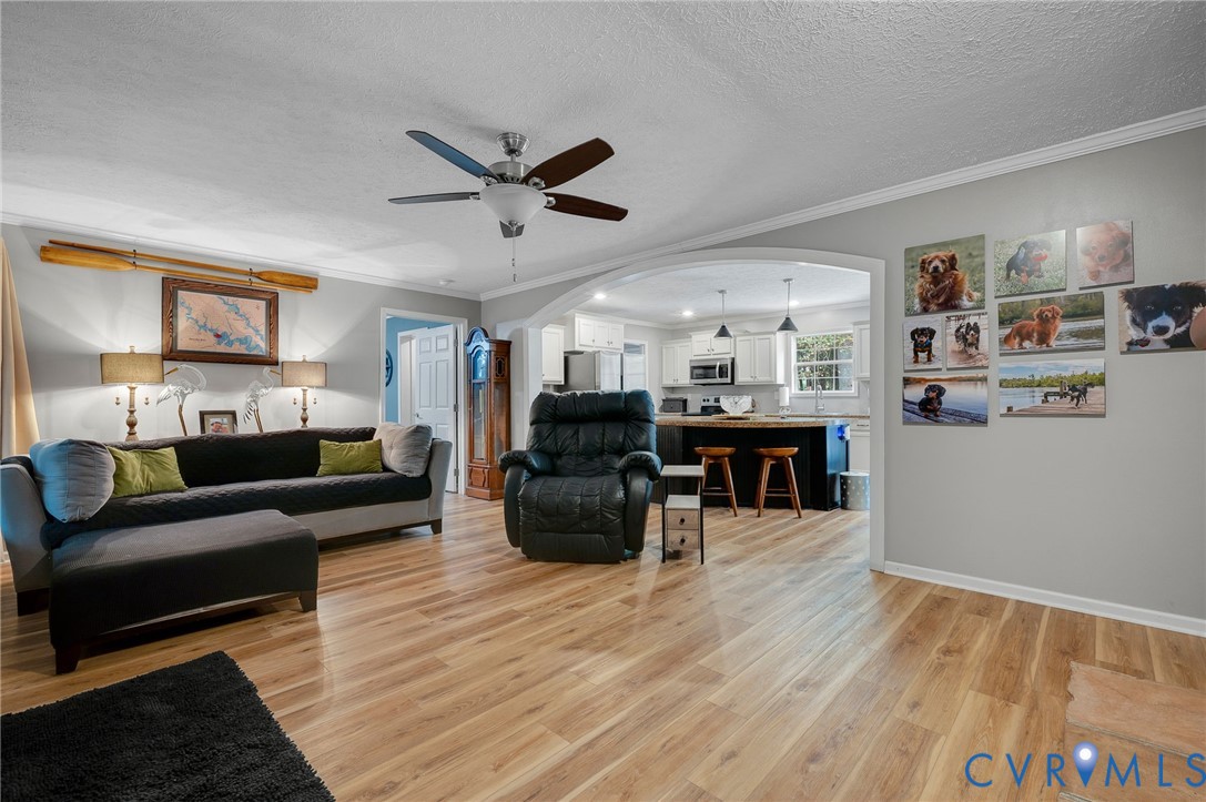 123 Riverview Road Stevensville, VA 23161 - Photo 5 of 28 Wood-finish flooring throughout, light gray wall c