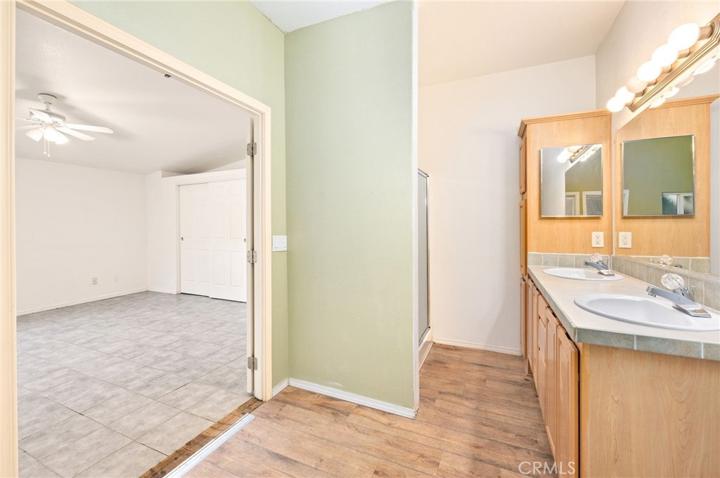 43870 Wilson Valley Road Hemet, CA 92544 - Photo 23 of 35 a view of a bathroom from a hallway