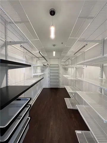 a view of an empty walk in closet
