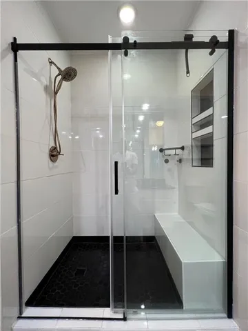 a kitchen with kitchen island a sink stove and refrigerator