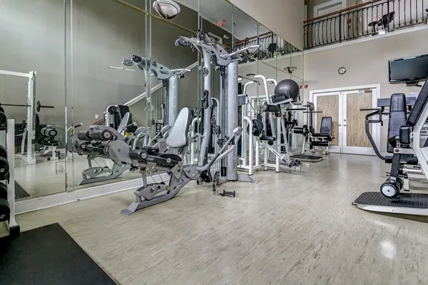 a view of a room with gym equipment