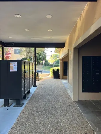 a view of hall way with furniture