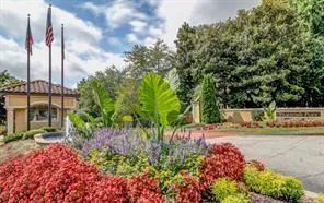 a view of a garden with a fountain