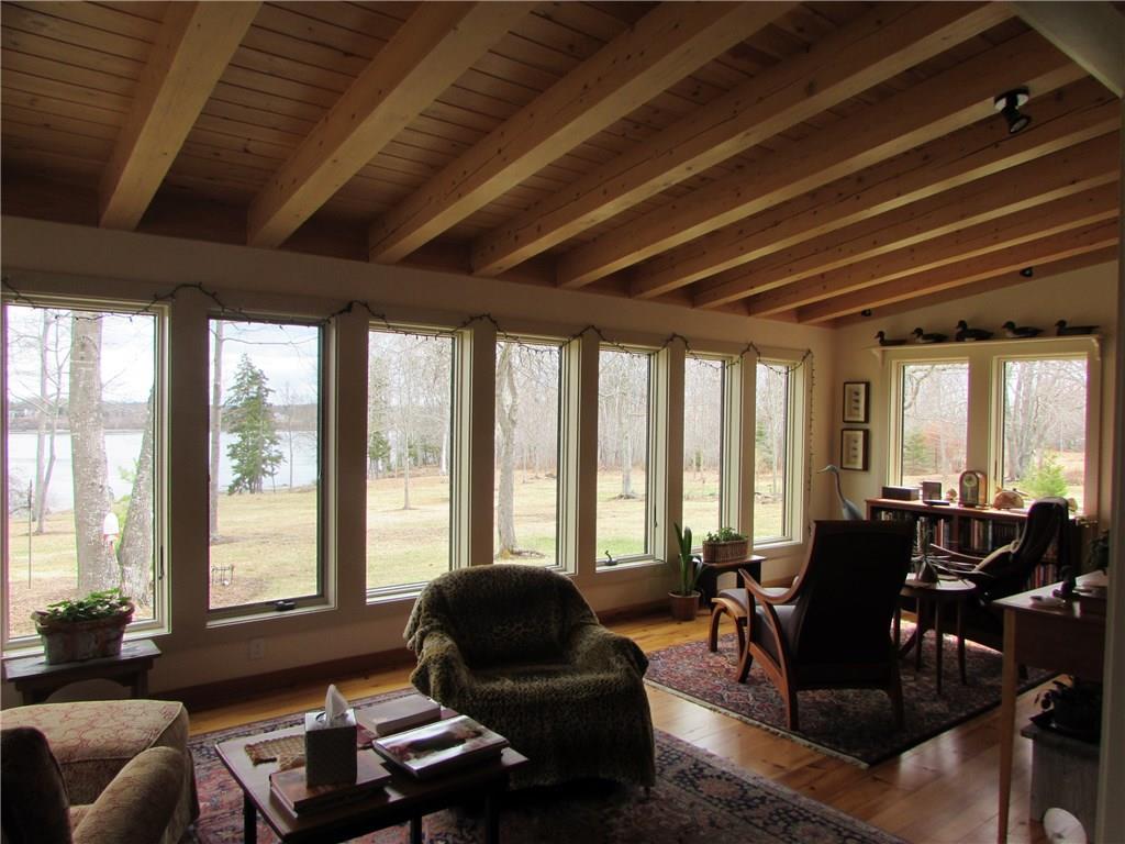 48 Moontide Castine, ME 04421 - Photo 19 of 35 Sun room with beams overlooking the...