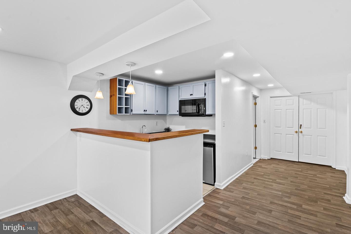 42827 Spinks Ferry Road Leesburg, VA 20176 - Photo 33 of 56 bar with microwave and refrigerator