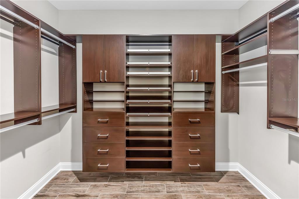 1270 Turnbridge Place Oviedo, FL 32765 - Photo 9 of 14 a view of walk in closet with empty racks