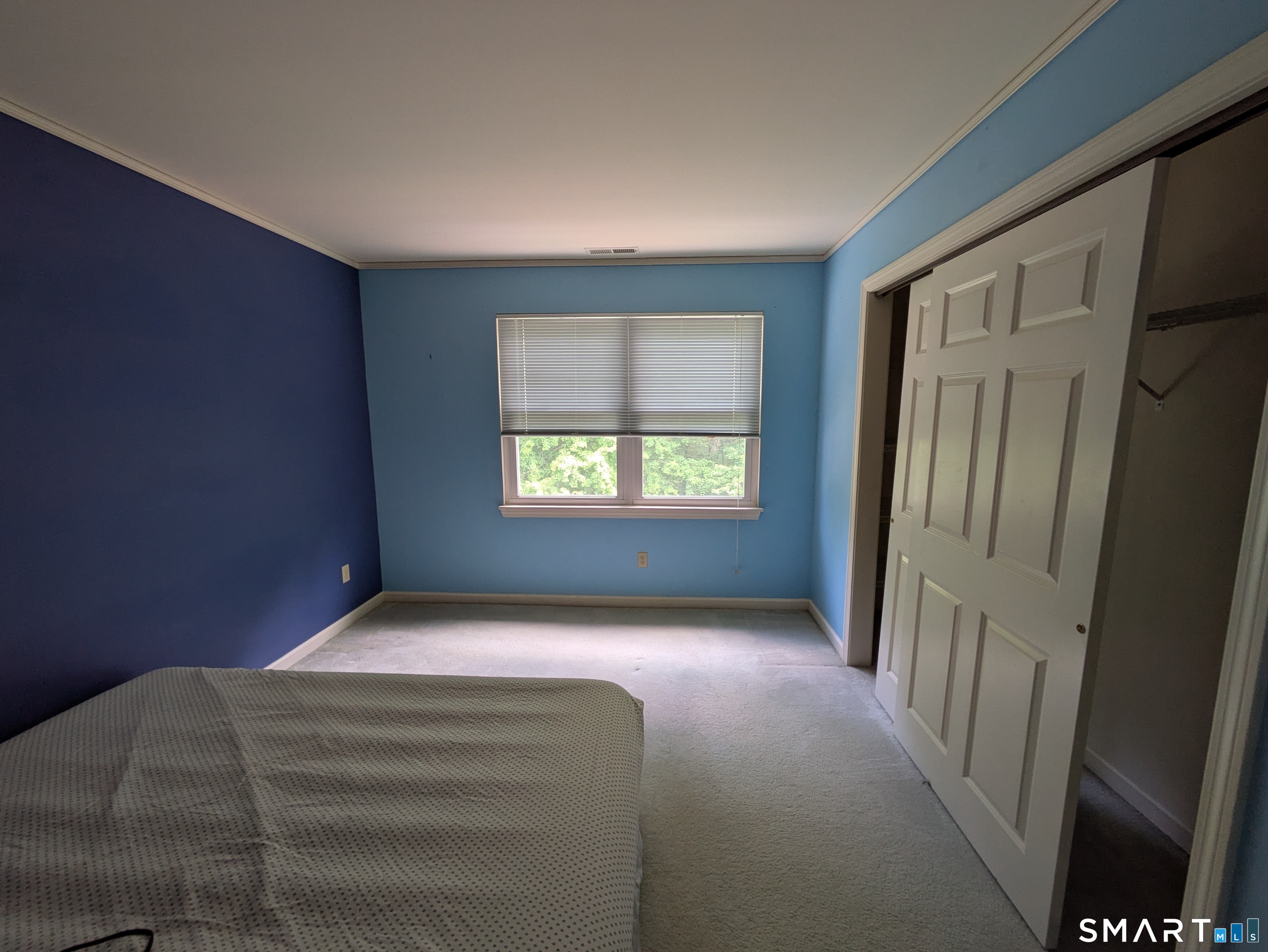 61 Basking Brook Road Shelton, CT 06484 - Photo 22 of 25 a view of a livingroom with a staircase