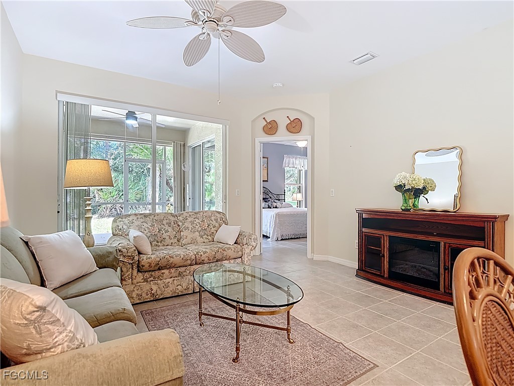 3600 Rue Alec Loop, Unit 4 North Fort Myers, FL 33917 - Photo 16 of 43 a living room with furniture and a wooden floor