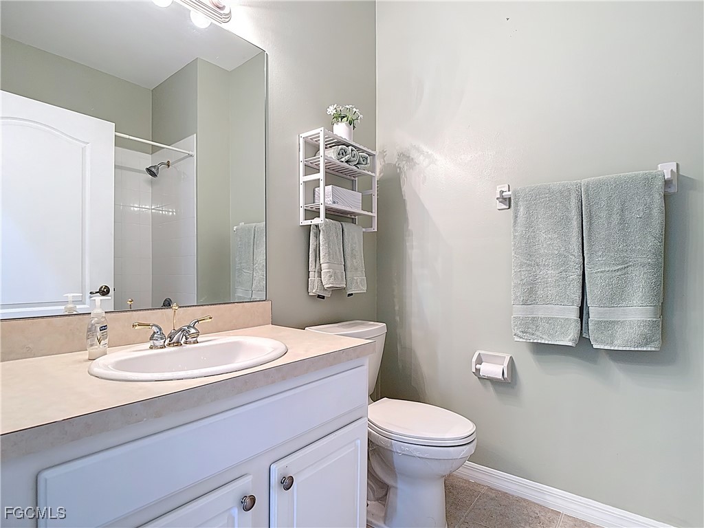 3600 Rue Alec Loop, Unit 4 North Fort Myers, FL 33917 - Photo 22 of 43 a bathroom with a sink toilet and shower