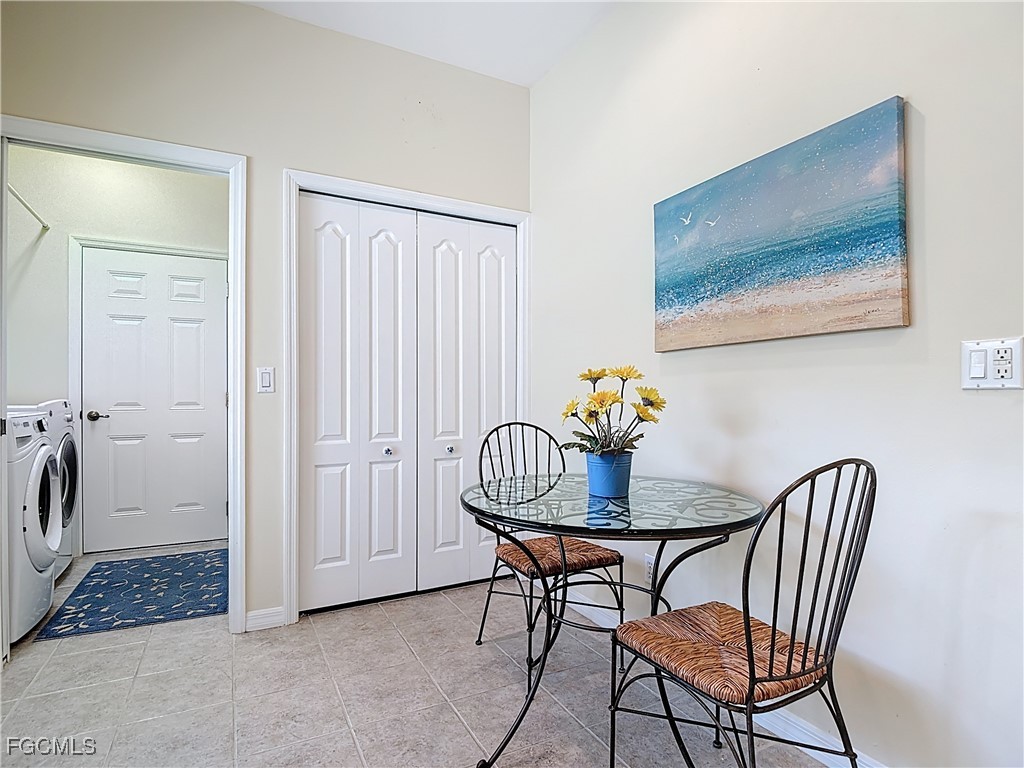 3600 Rue Alec Loop, Unit 4 North Fort Myers, FL 33917 - Photo 9 of 43 a view of a dining room with furniture and wooden floor