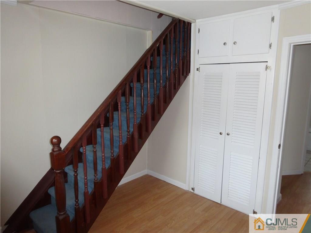 25 Sturgis Road Edison, NJ 08817 - Photo 7 of 8 a view of an entryway with wooden floor