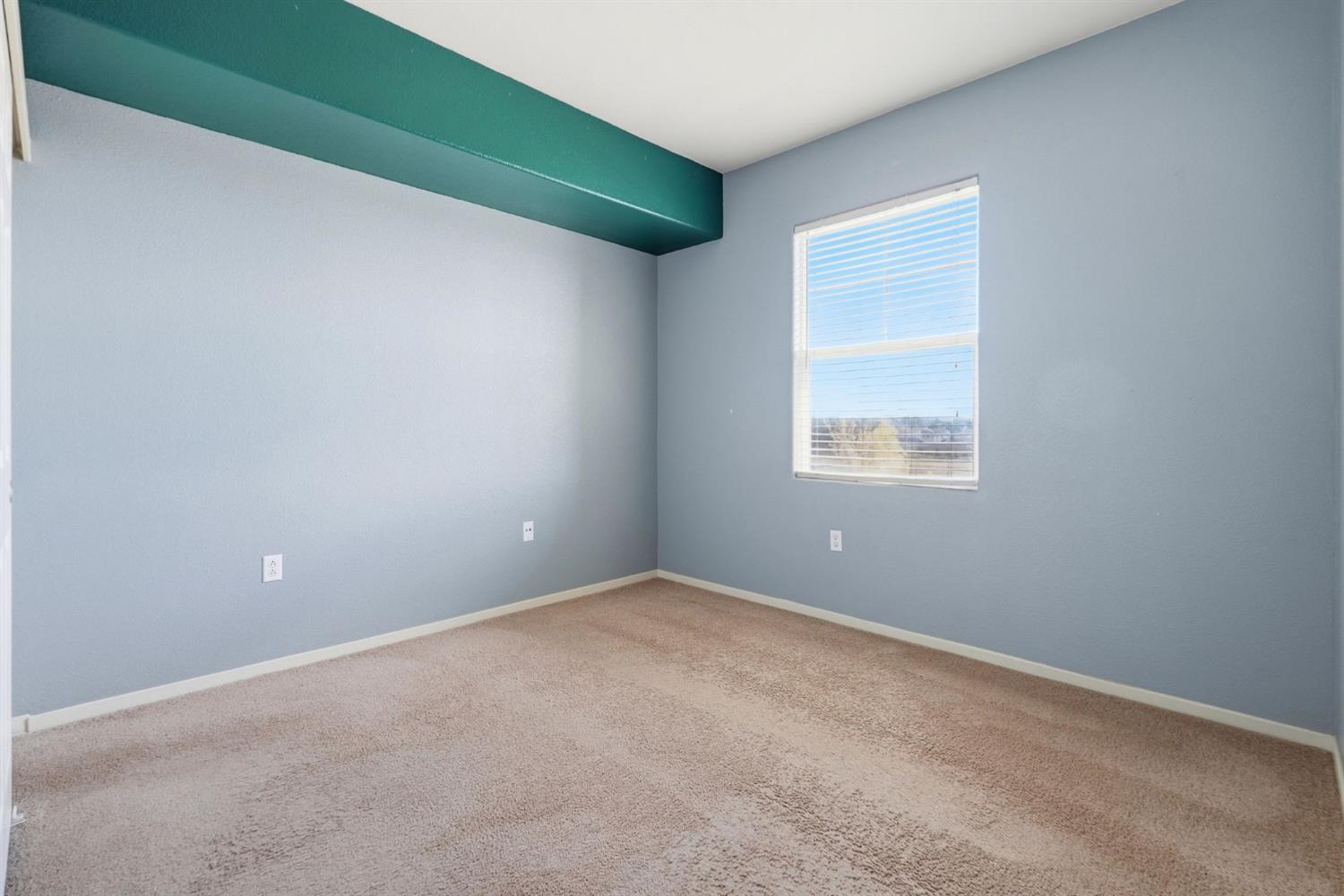1240 Whitney Ranch Parkway, Unit PW338 Rocklin, CA 95765 - Photo 19 of 58 an empty room with windows