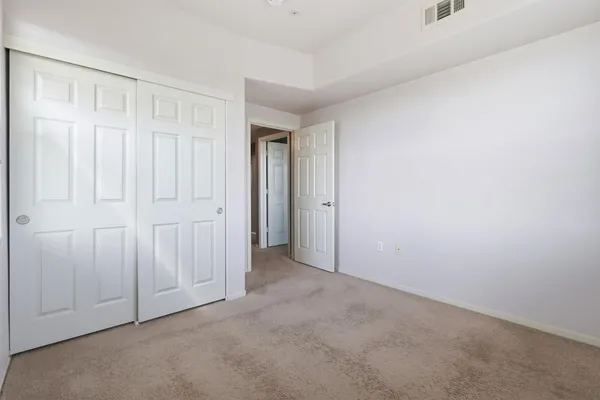 an empty room with closet