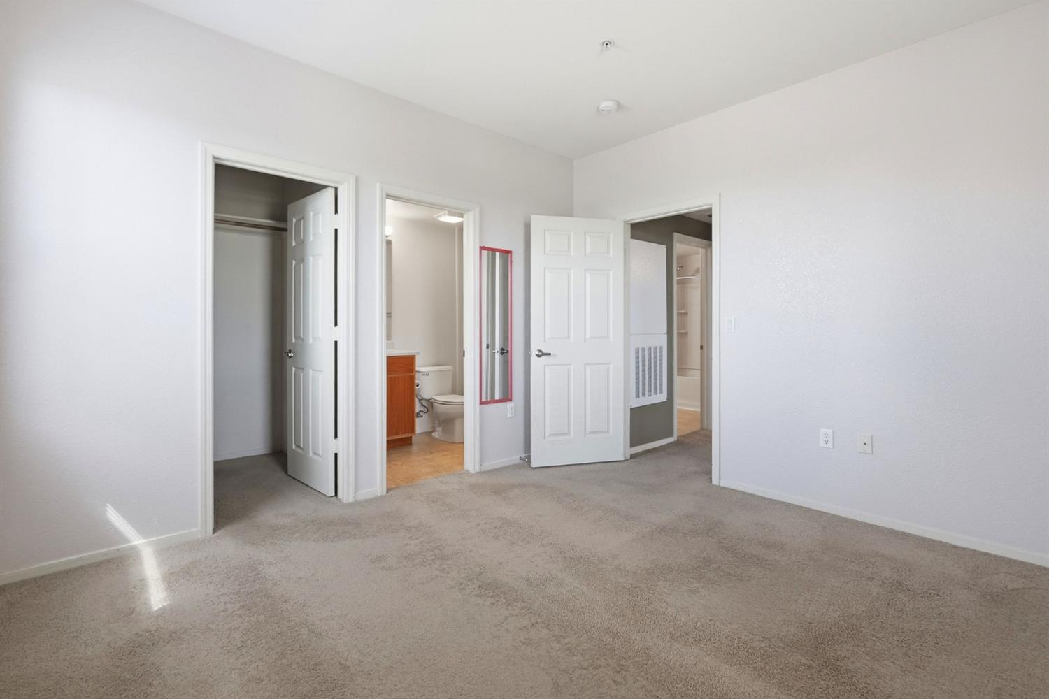 1240 Whitney Ranch Parkway, Unit PW338 Rocklin, CA 95765 - Photo 25 of 58 an empty room with closet and a bathroom