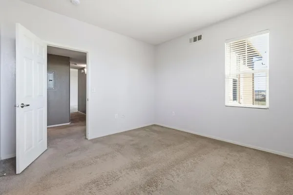 a bathroom with a sink toilet vanity and shower