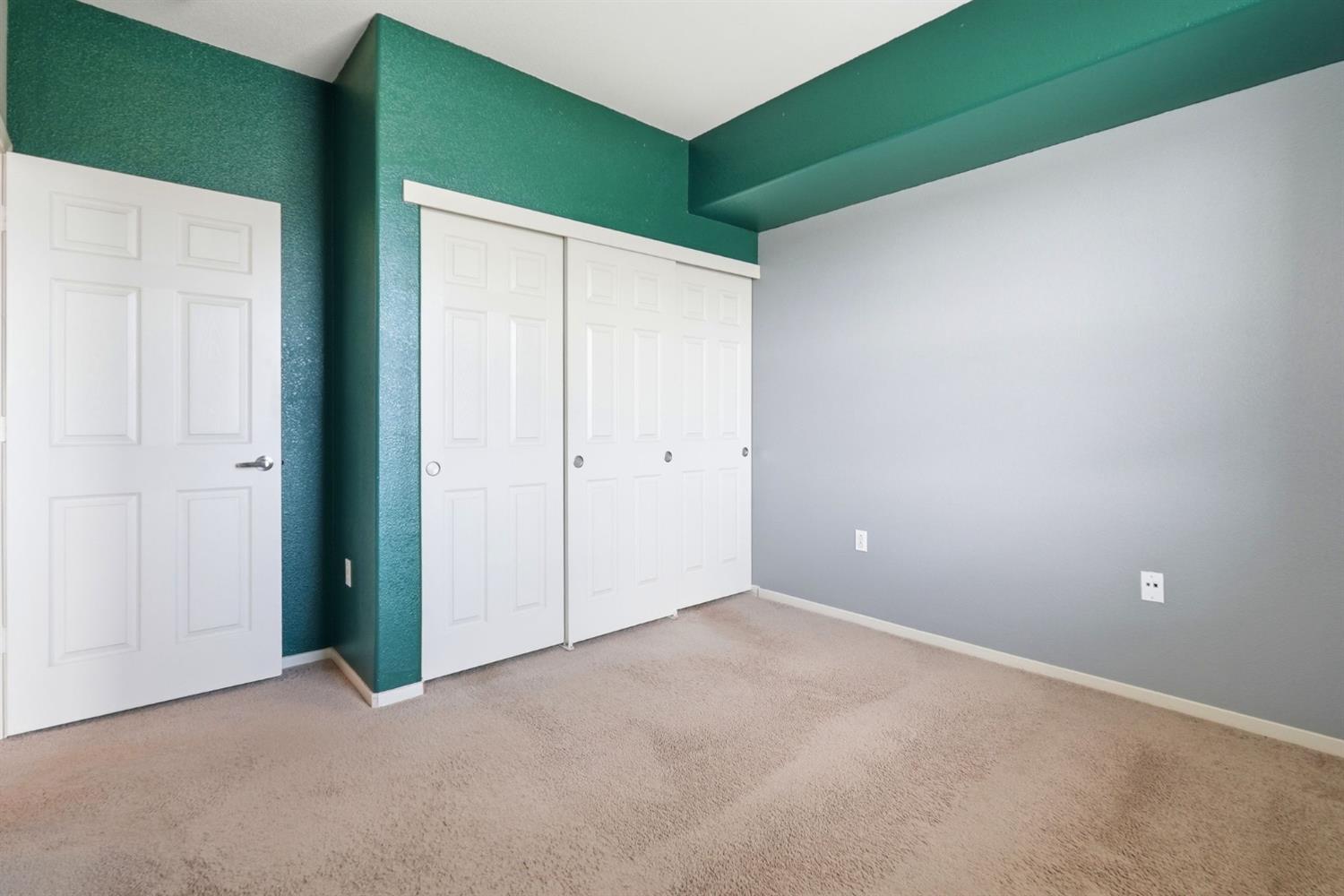 1240 Whitney Ranch Parkway, Unit PW338 Rocklin, CA 95765 - Photo 27 of 58 an empty room with closet