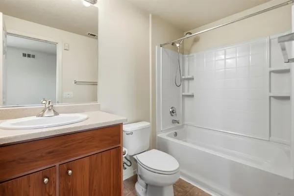 a front view of a building with garden