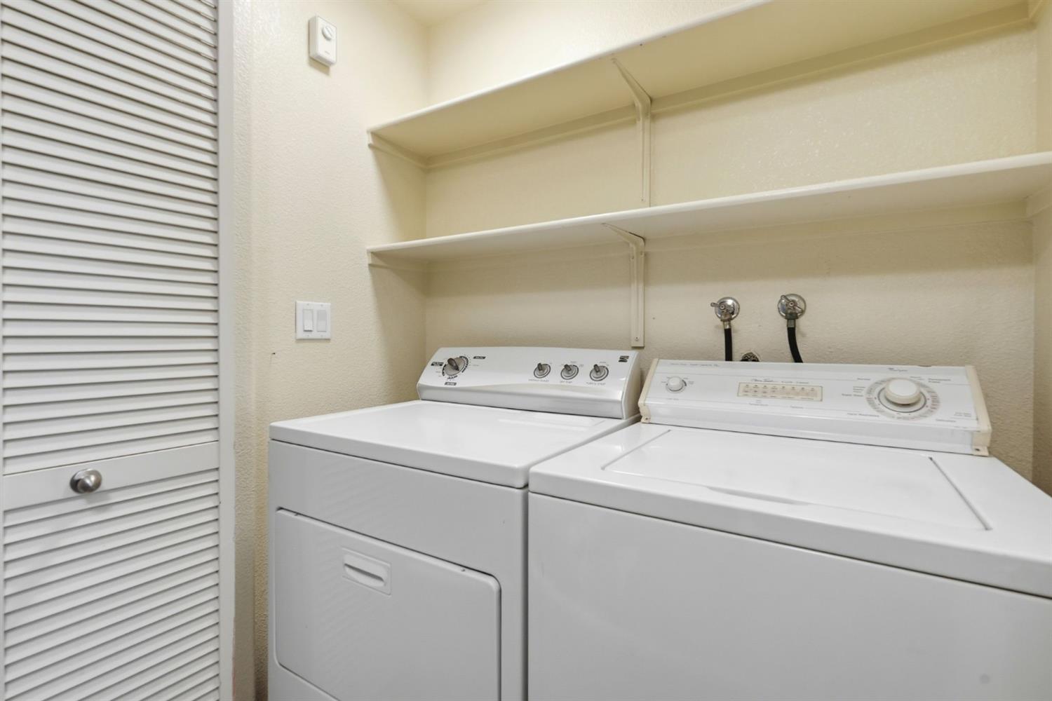 1240 Whitney Ranch Parkway, Unit PW338 Rocklin, CA 95765 - Photo 32 of 58 a utility room with dryer and washer