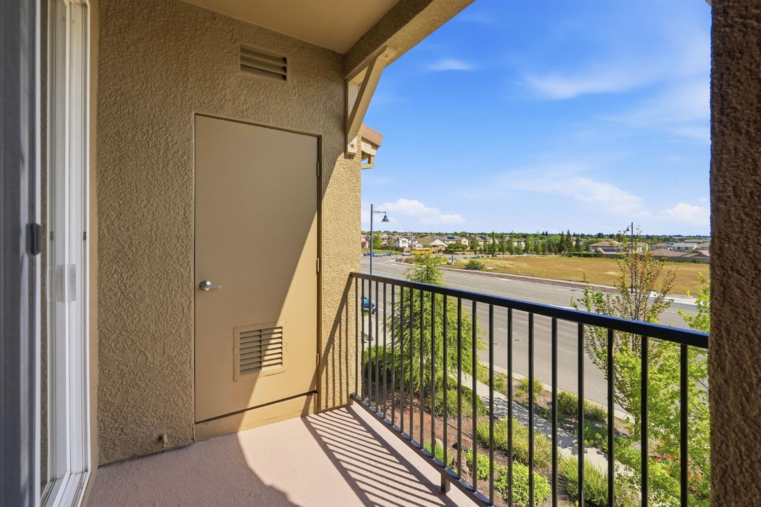 1240 Whitney Ranch Parkway, Unit PW338 Rocklin, CA 95765 - Photo 34 of 58 a view of balcony with wooden floor and city view