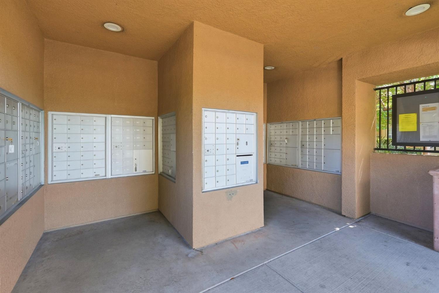 1240 Whitney Ranch Parkway, Unit PW338 Rocklin, CA 95765 - Photo 52 of 58 a view of an empty room with window and cabinet