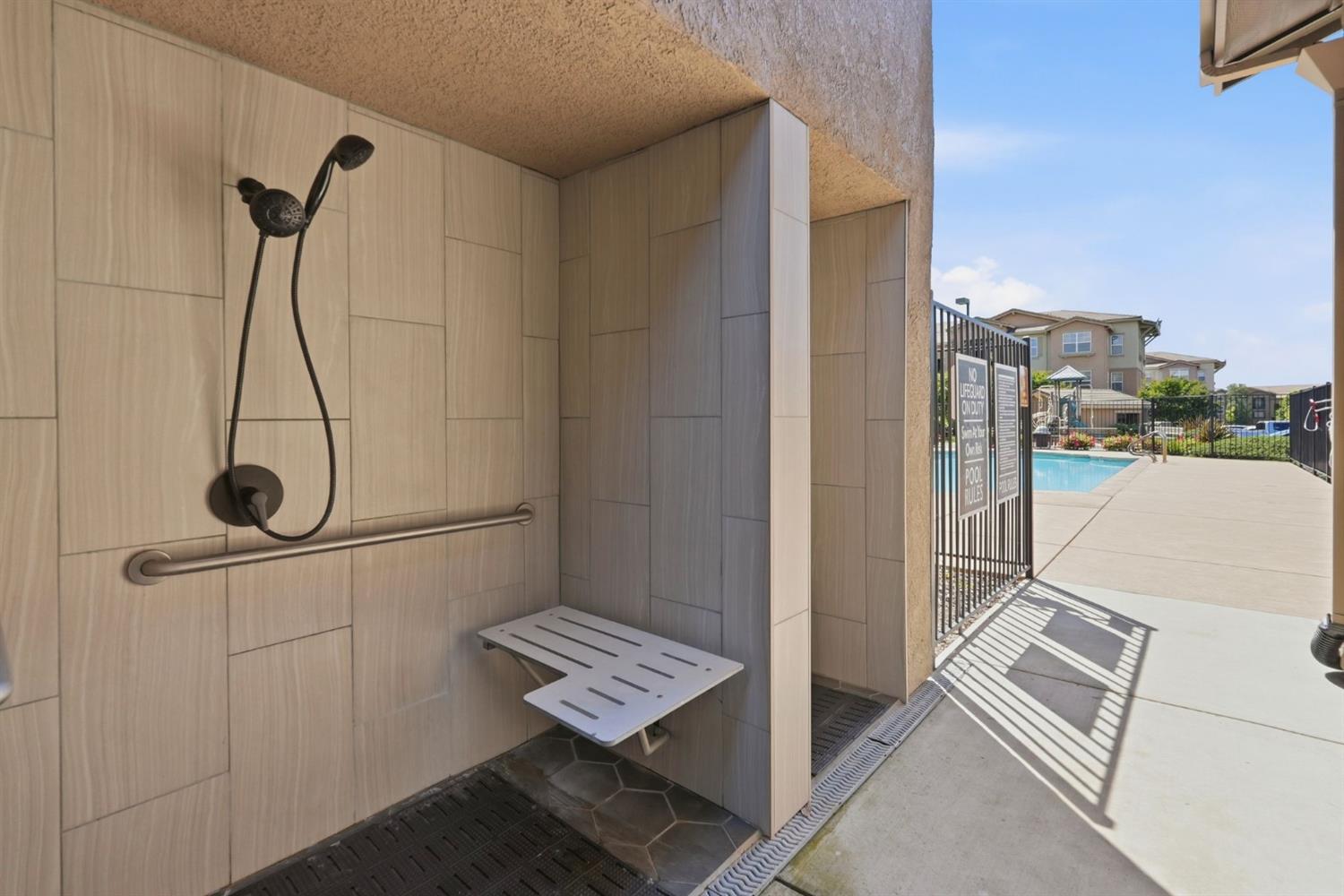 1240 Whitney Ranch Parkway, Unit PW338 Rocklin, CA 95765 - Photo 57 of 58 a view of a room with wooden floor and windows