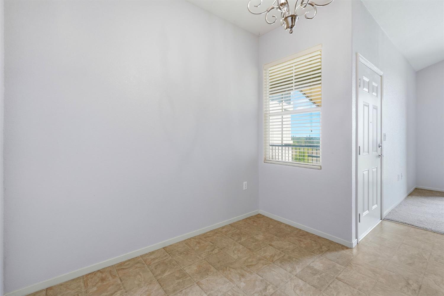 1240 Whitney Ranch Parkway, Unit PW338 Rocklin, CA 95765 - Photo 7 of 58 an empty room with windows