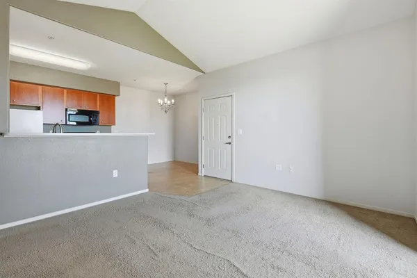 a view of a kitchen with a sink