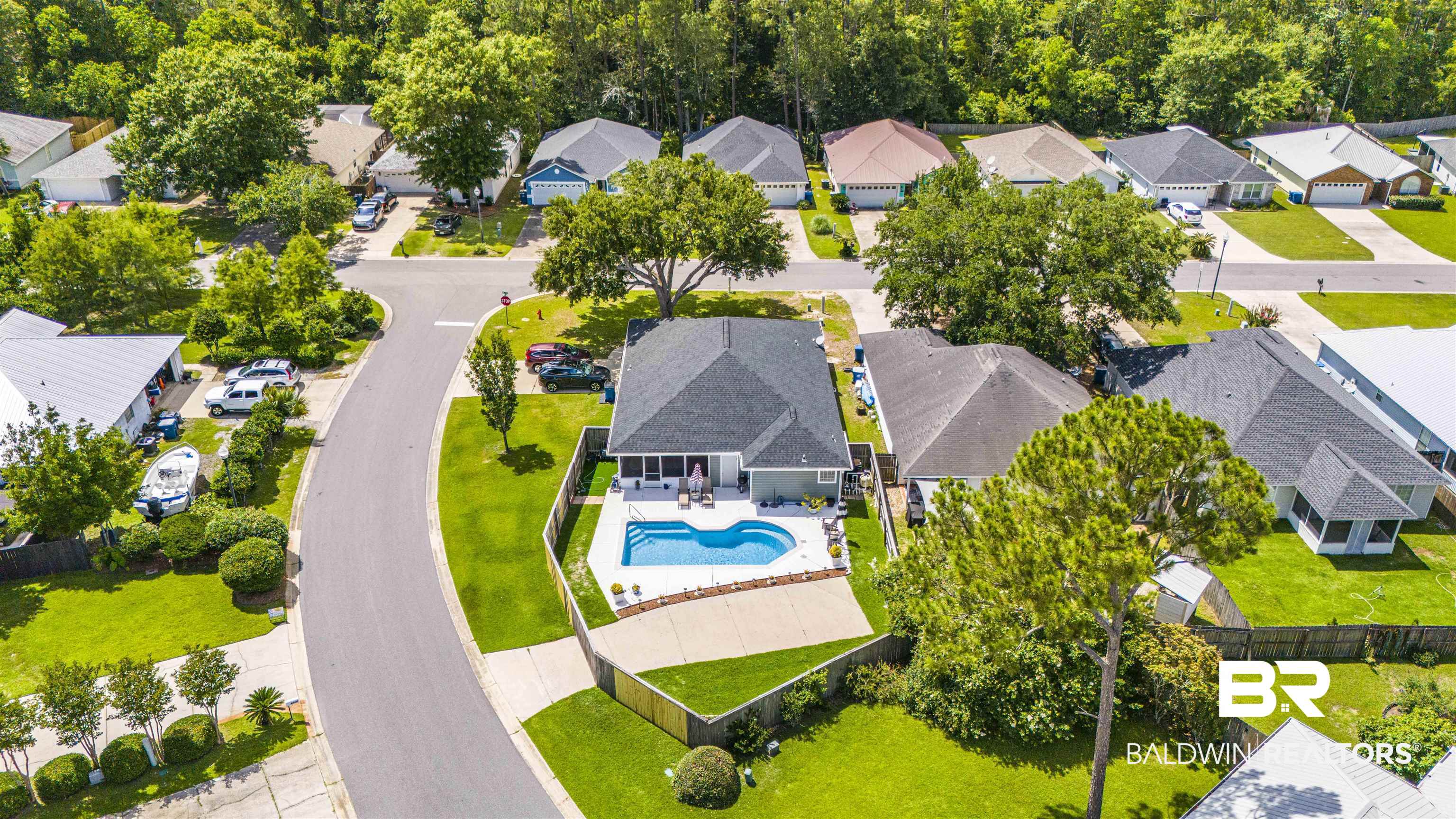 4620 Pine Boulevard Orange Beach, AL 36561 - Photo 41 of 49 Aerial perspective of suburban area featuring a pool