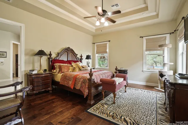 a bathroom with a tub shower and sink