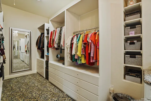 a bedroom with bed and a window