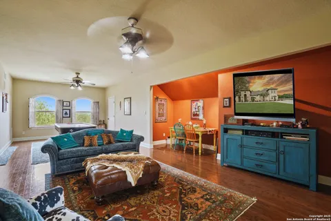 a kitchen with a sink stove top oven and cabinets