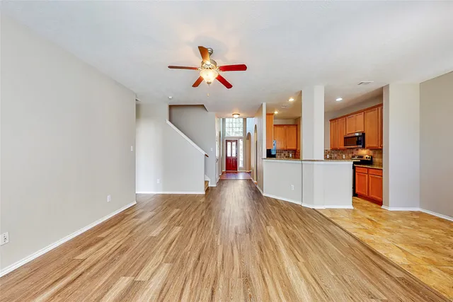 a view of a livingroom with a ceiling fan