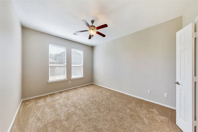 a view of kitchen with furniture and flat screen tv