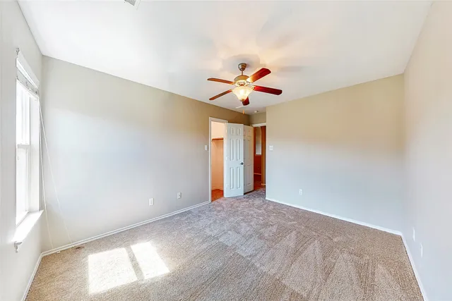 a view of a kitchen with a sink and cabinets
