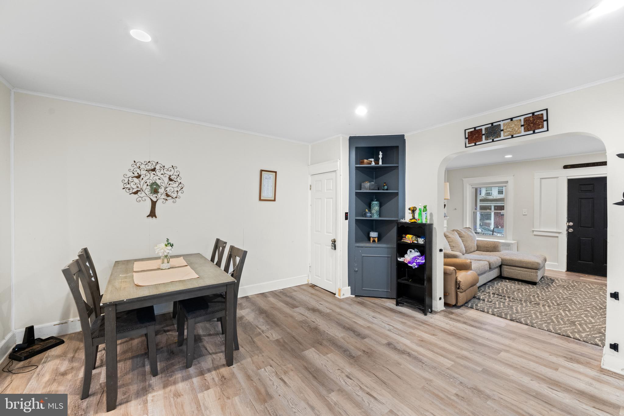 1009 Queen Street Pottstown, PA 19464 - Photo 6 of 17 a living room with furniture and wooden floor