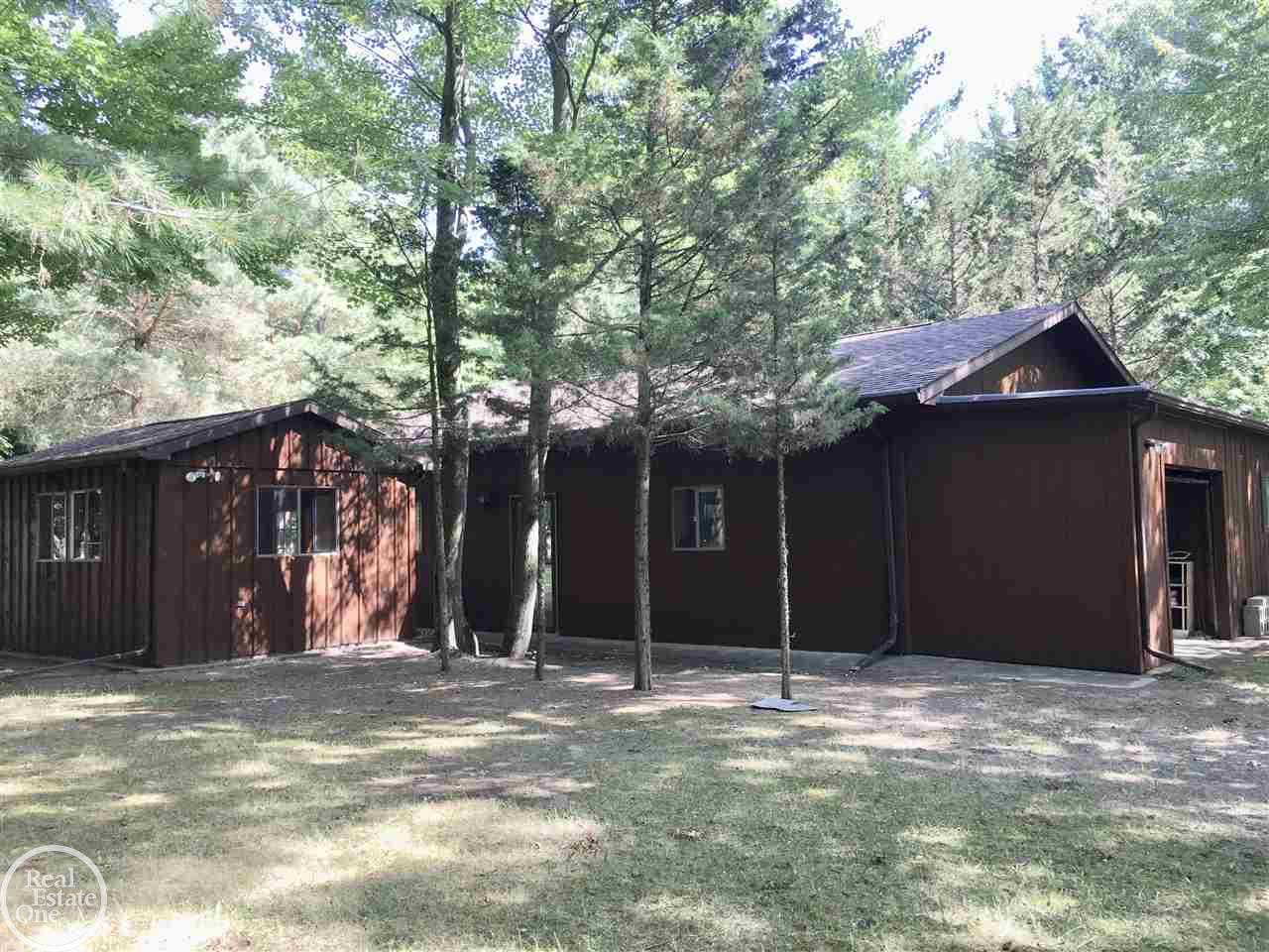 6044 Port Austin Road Caseville, MI 48725 - Photo 33 of 47 Side view of 30' x 50' building and separate 12' x 16 ' building