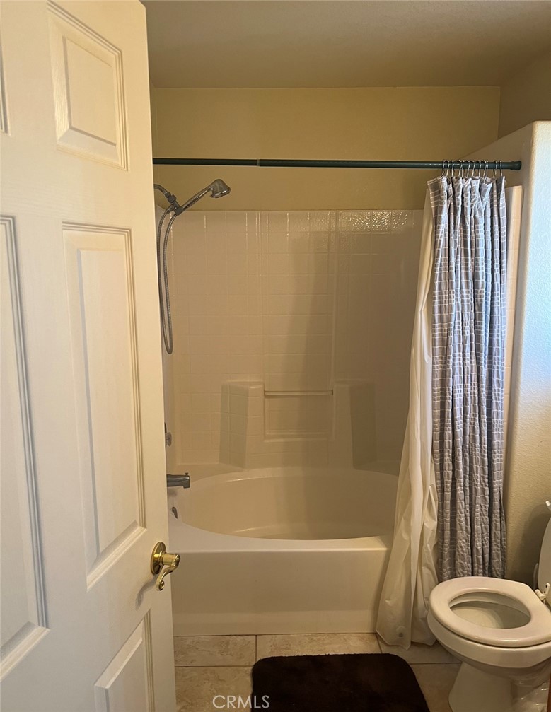32636 Sapphire Road Lucerne Valley, CA 92356 - Photo 12 of 19 a bathroom with a shower and a toilet