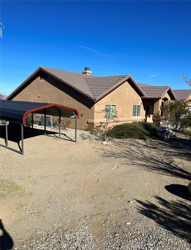 32636 Sapphire Road Lucerne Valley, CA 92356 - Photo 18 of 19 a view of a house with a yard