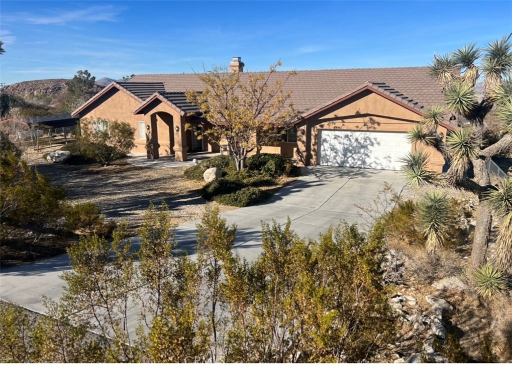 32636 Sapphire Road Lucerne Valley, CA 92356 - Photo 19 of 19 a view of a house with a yard