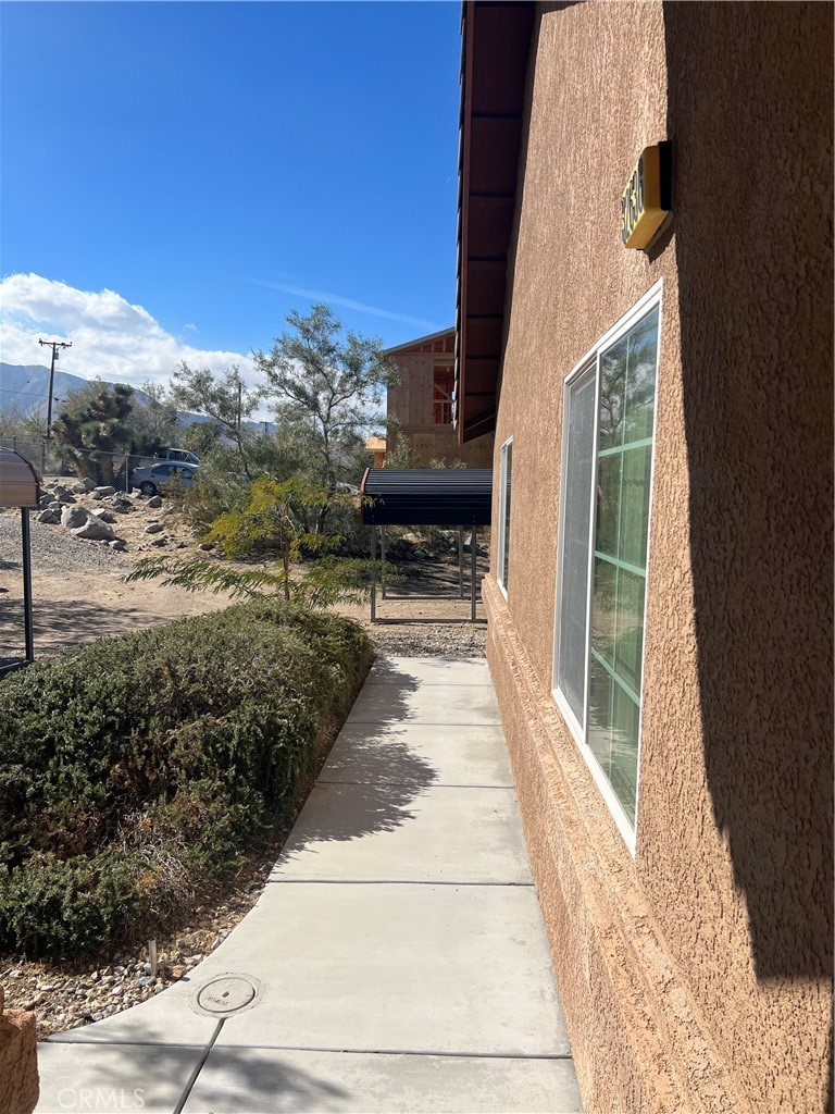 32636 Sapphire Road Lucerne Valley, CA 92356 - Photo 4 of 19 a view of a pathway with a yard