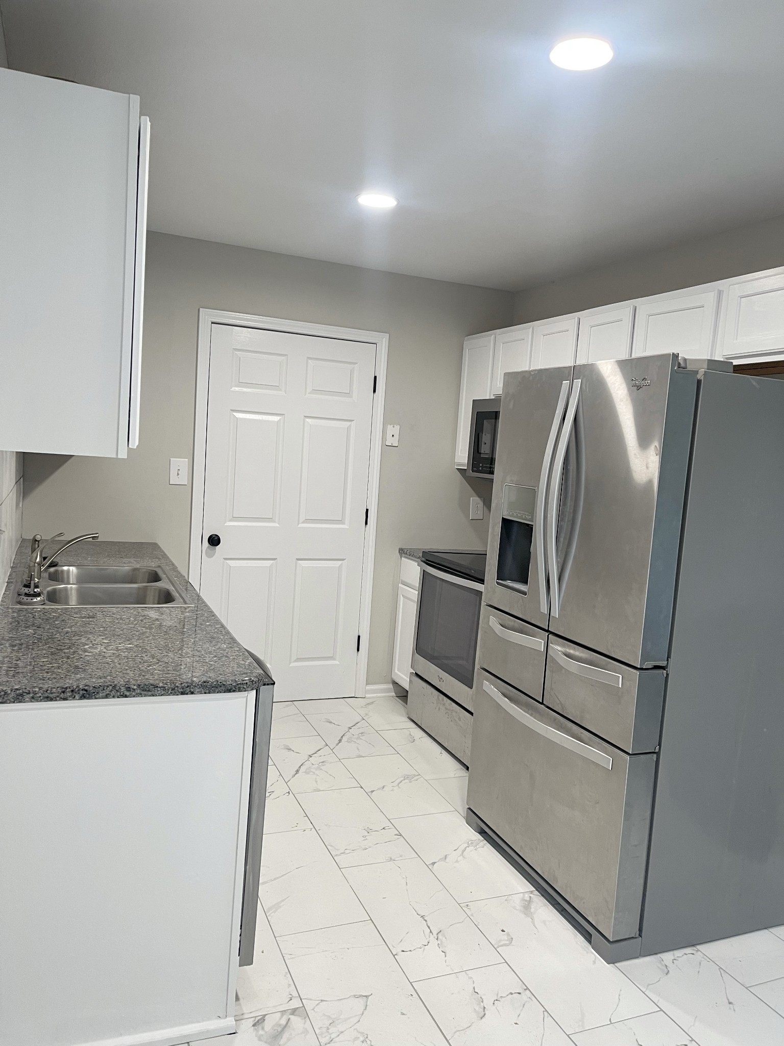1845 Hugh Hunter Road Oak Grove, KY 42262 - Photo 5 of 6 a kitchen with a refrigerator sink and stove