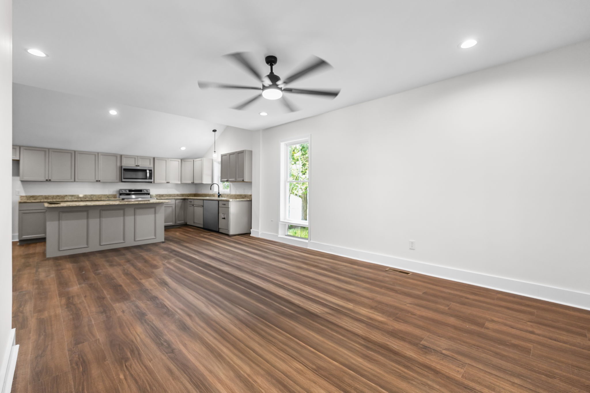 1881 New Herman Road Fayetteville, TN 37334 - Photo 11 of 58 a view of a kitchen with a sink a refrigerator and window