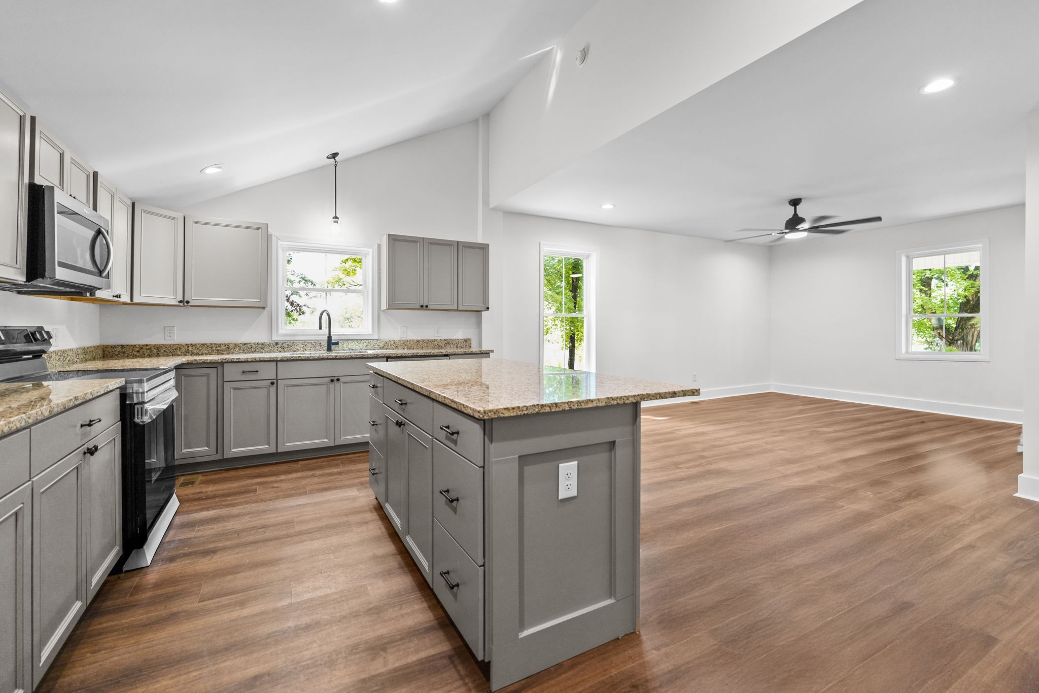 1881 New Herman Road Fayetteville, TN 37334 - Photo 14 of 58 a kitchen with stainless steel appliances granite countertop wooden cabinets and a sink