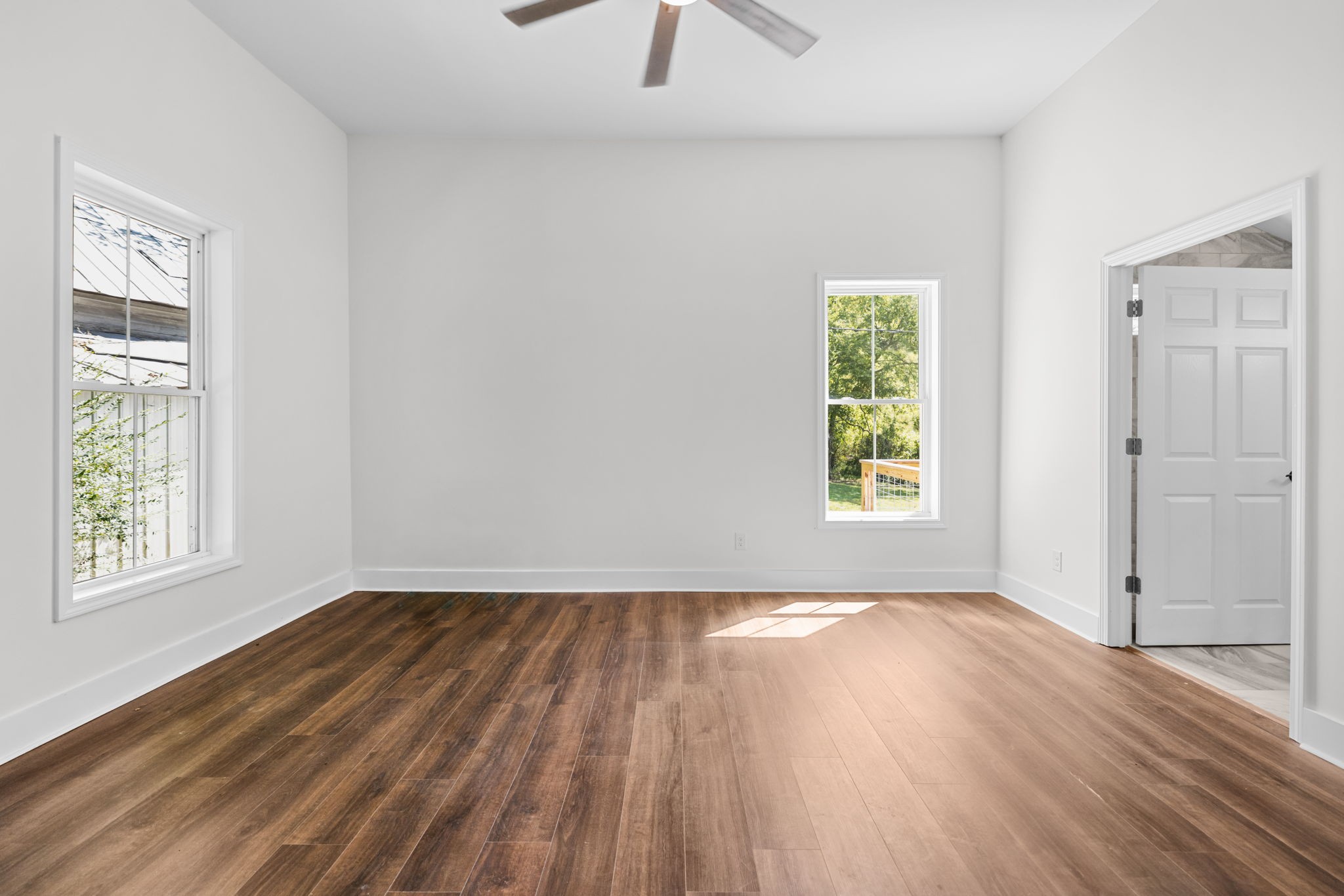 1881 New Herman Road Fayetteville, TN 37334 - Photo 26 of 58 a view of an empty room with wooden floor and a window