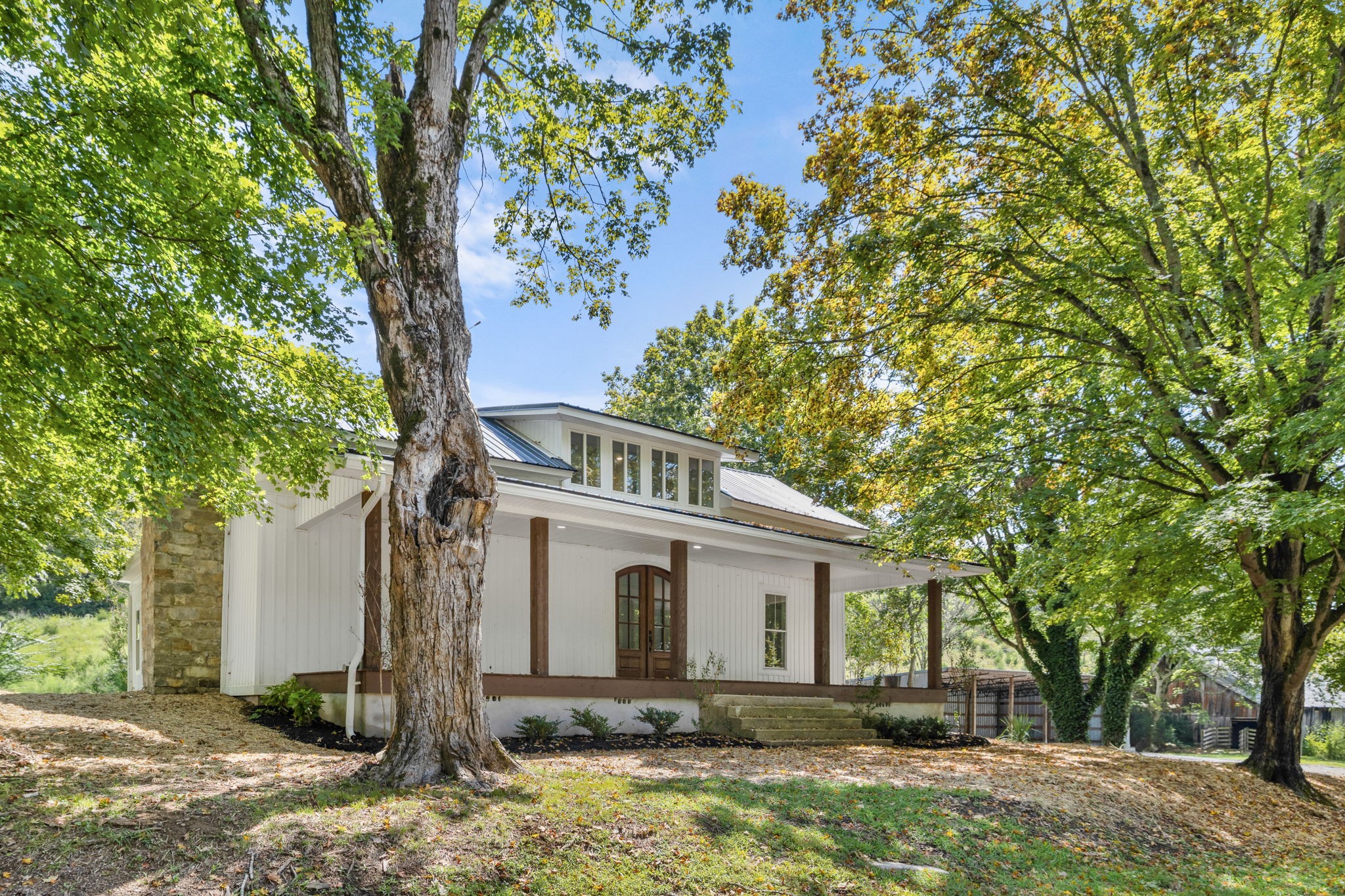1881 New Herman Road Fayetteville, TN 37334 - Photo 3 of 58 a front view of a house with a yard