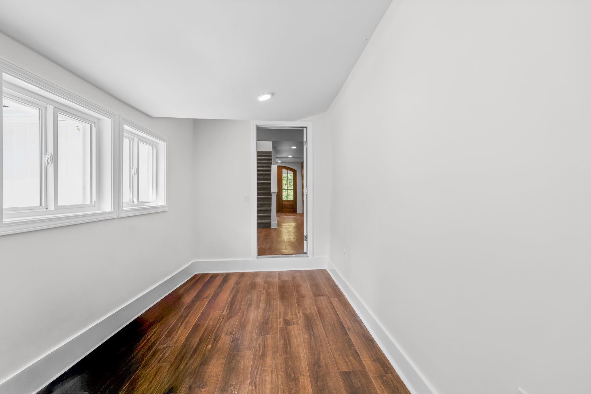 1881 New Herman Road Fayetteville, TN 37334 - Photo 31 of 58 a view of empty room with wooden floor and fan